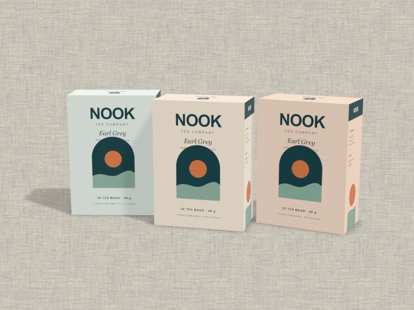 Packaging mockup: Three tea cartons on linen